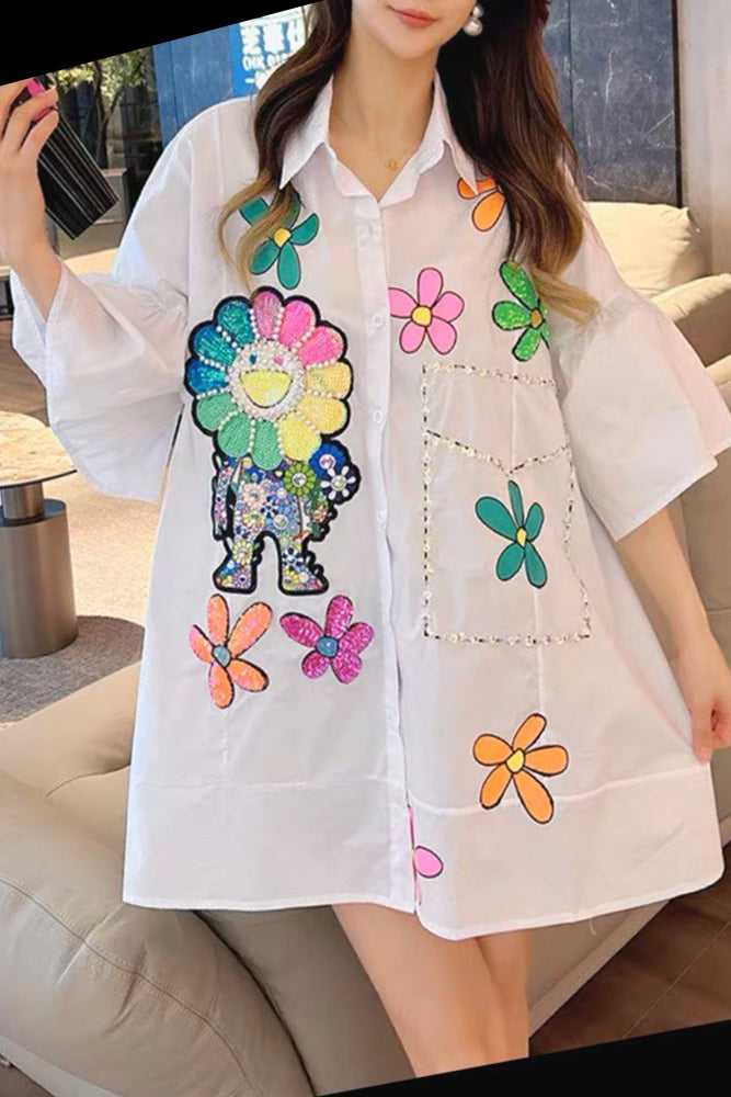 Nancy Yang Mode Inc., Robe en coton à manches courtes et imprimé pétales ornés